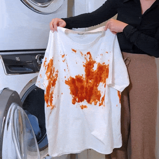 GIF of Alexie washing a white shirt covered in spaghetti sauce with Laundry Leaf