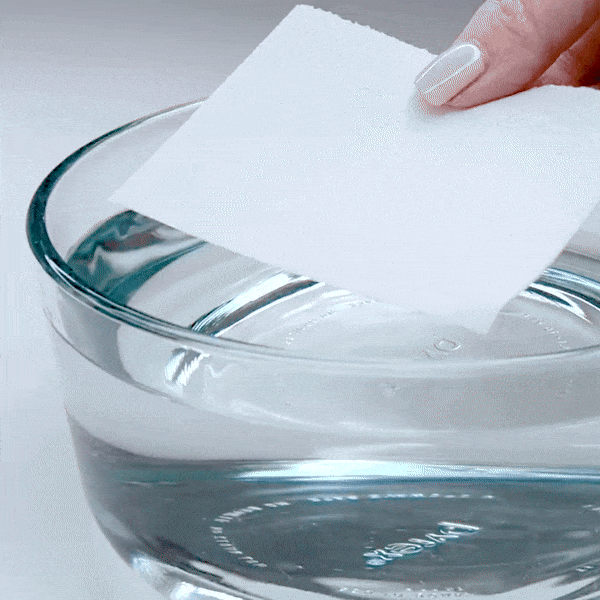 GIF of a Laundry Leaf Detergent Sheet easily dissolving in water