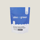 Package of also green toilet bowl cleaner tablets on a light gray background